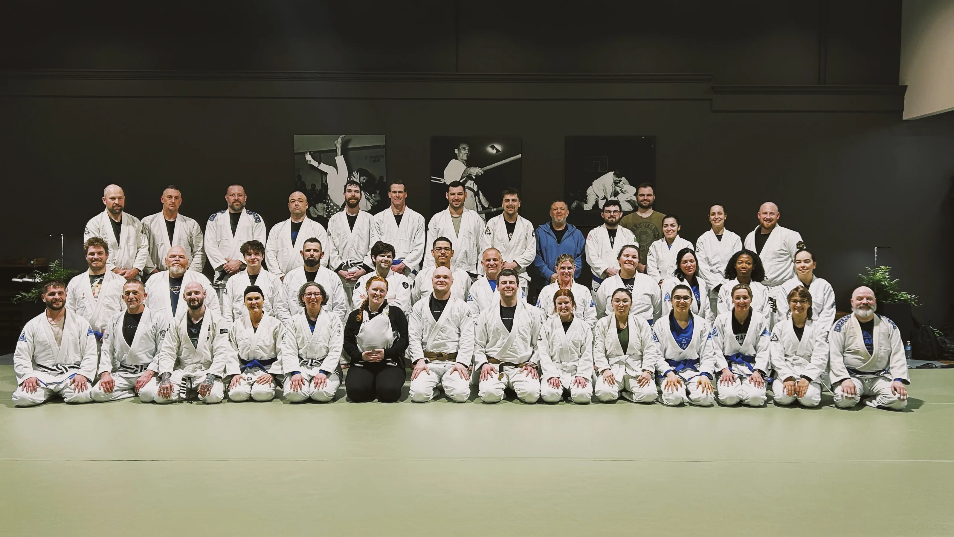 The full academy roster gathered together on the mat.